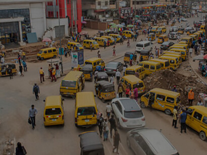 A panoramic view of Nigeria's traffic, where roads are packed with vehicles, illustrating the daily hustle and bustle of city life