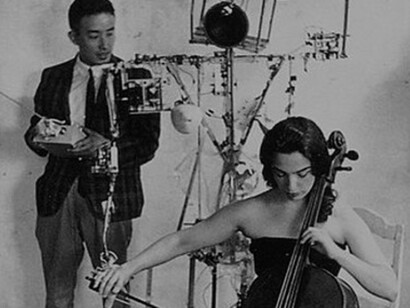 Nam June Paik with Charlotte Moorman and K-456. robot