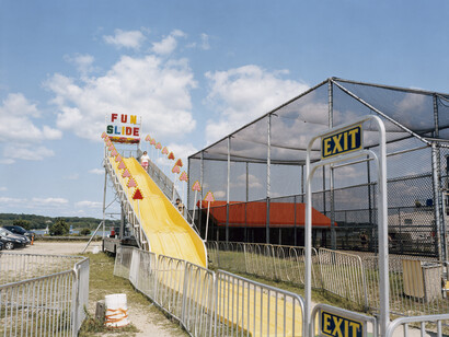 Tina Barney, Fun Slide, 2017, chromogenic color print, 48 x 60 inches, 121.9 x 152.4 cm, Edition of 5 (#1/5)© Tina Barney. Courtesy Paul Kasmin Gallery