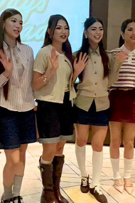 BINI standing together in coordinated, stylish outfits, representing the brand’s vision of warmth, ease, and togetherness