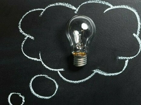 A light bulb inside a thought bubble, a reminder that cultivating individual thought is more crucial than ever in this age of information overload