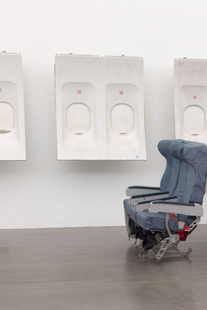 Untitled
2018
15 airplane window panels with wood and metal mounting; 3 airplane bench seats
Window panels: each 130 x 106 x 38 cm / 51 1/8 x 41 3/4 x 15 in
Bench seats: each 116 x 154 x 56 cm / 45 5/8 x 60 5/8 x 22 in
Installation dimensions variable
Photo: Todd- White