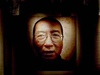 Cartel con el rostro de Liu Xiabo