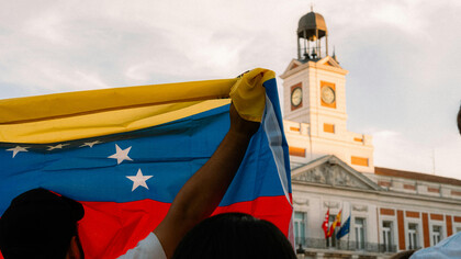 Madrid, Spain Venezuelan flag waving during a protest at Puerta del Sol
