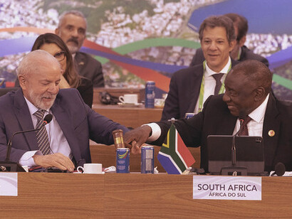 Presidents Cyril Ramaphosa and Luiz Inácio Lula da Silva share a light-hearted moment at the G20 Summit in Rio de Janeiro, highlighting the strong camaraderie between South Africa and Brazil as they collaborate on global economic challenges