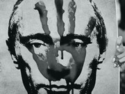 A blood imprint on Vladimir Putin's face, President of Russia