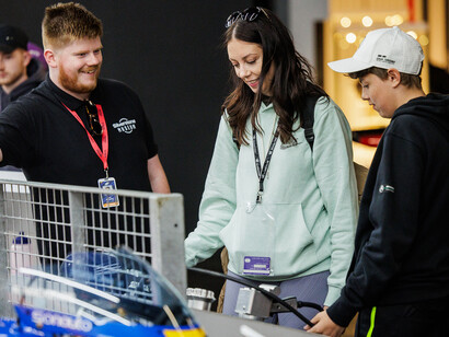 Engaging displays and multimedia presentations offer a behind-the-scenes look at the intense preparation, strategy, and teamwork involved in professional racing