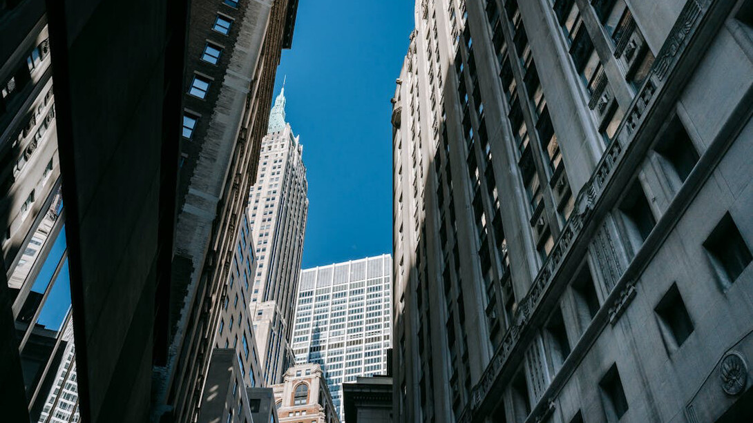 Corporate headquarters symbolizing the nexus of profit-driven decisions that shape global economies and ecosystems, often at the expense of sustainability and societal well-being