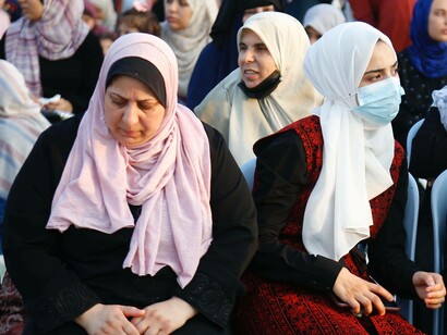 Women gather around in the Gaza strip