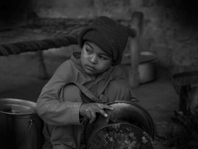 A young boy struck with poverty and is affected by the negligent behavior of those who are responsible in this world