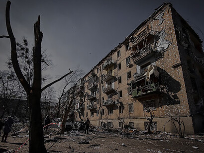 Kyiv, Ukraine, bears the scars of Russian attacks, with one of its buildings left in ruins