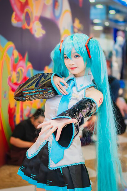 The anime festival featured a cosplayer with long blue hair, perfectly embodying a beloved character from Japanese pop culture