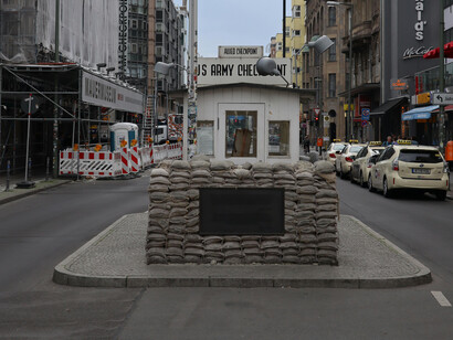 Checkpoint Charlie has become one of Berlin's primary tourist attractions
