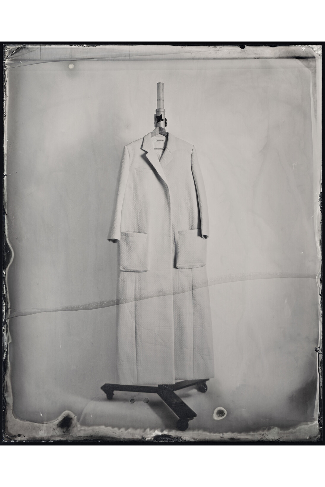 Kasia Wozniak, Wet Plate Collodion Ambrotype, Inspiration from the pages of Sherlock Holmes: “He hustled on his overcoat…” [A Study in Scarlet by Arthur Conan Doyle] “…the clothes are commonplace … save only the overcoat which is full of suggestive touches.” [The Valley of Fear by Arthur Conan Doyle], Fashion credits: Coat: Anna Bezgubenko, MA Fashion Design Technology Menswear, London College of Fashion, 2014, © Kasia Wozniak/Museum of London