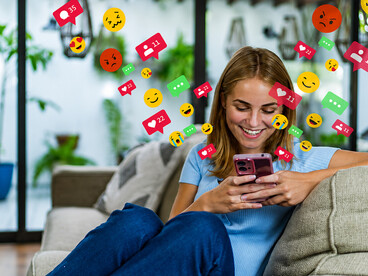 Using her mobile phone at home, a teenage girl navigates social media platforms in a digital montage filled with notifications, likes, and virtual interactions