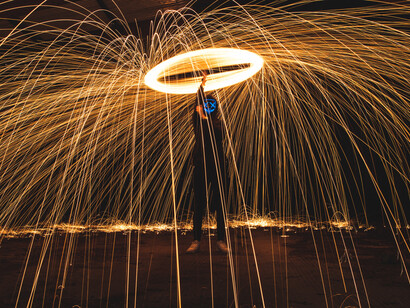 A man in steel wool photography; for stability to be lasting, the energy must be greater than the system
