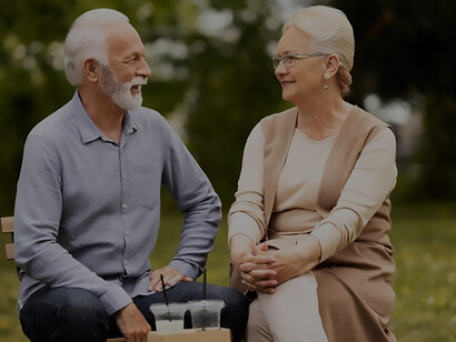 Radiant senior couple engages in outdoor activities, supporting healthy brain aging and longevity