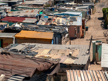 In the township of Khayelitsha in Cape Town, South Africa, poverty's grip is palpable as residents navigate makeshift homes and limited resources, underscoring the urgent need for comprehensive strategies to address systemic inequalities beyond the scope of B-BBEE