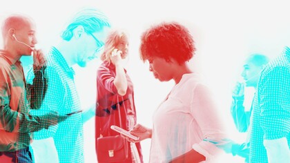 Individuals seemingly engrossed in their smartphones, representing pervasive connectivity and a culture of individuation in the evolving network society