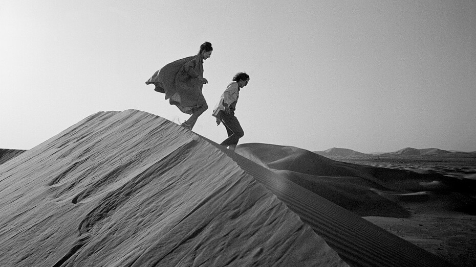 ‘Christo and Jeanne-Claude looking for a possible site for The Mastaba’, February 1982 
Print Size: 19 7/8 x 30" (50.4 x 76.4 cm) 
Photo: Wolfgang Volz© 
Courtesy Galerie Gmurzynska 
© Christo 
