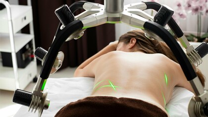 A patient receiving a non-invasive laser-assisted procedure, reflecting the growing preference for treatments with minimal downtime