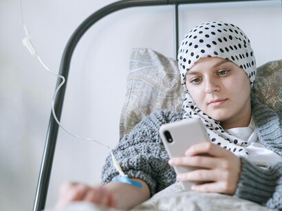 A patient trying be distracted while being treated for sickle cell disease