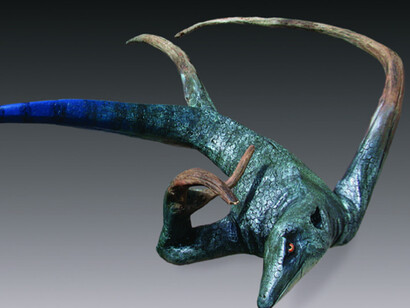 Blue Tail" by Bernie Houston, Carved driftwood with hand punched skin, acrylics and metallic paints, 39" x 27" x 7". 