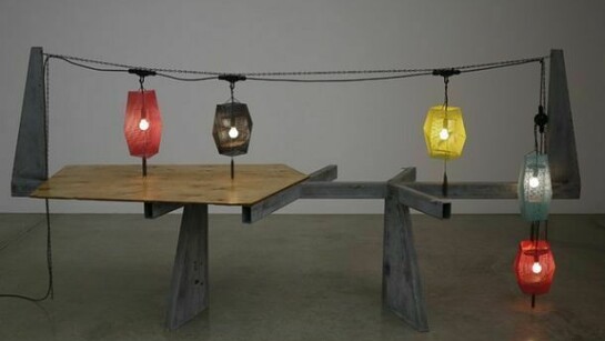 Martin Boyce, Against the Night 2013, Perforated steel, steel chain, plywood, wood stain, wood oil, galvanized steel, wired electrical lights, installation dimensions variable, Courtesy the artist and Tanya Bonakdar Gallery, New York.