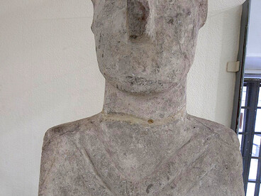 The Urfa Statue, the oldest known life-sized human sculpture to have survived intact, was unearthed in the mid-1990s beneath the Old City of Urfa, just north of Balıklıgöl. It was discovered within a large Pre-Pottery Neolithic settlement, evidenced by the presence of distinctive "terrazzo floors" from Neolithic houses and characteristic flint tools typical of that era, Türkiye