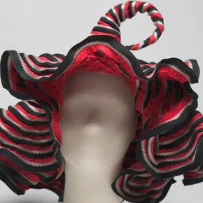 Hat, c. 2001. Metal zippers, thread. Cat Chow, United States. Gift of the Estate of Ruth Horwich.  Courtesy of the Chicago History Museum