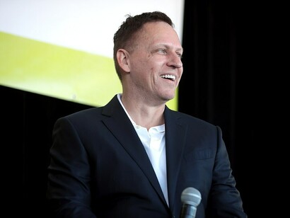 At the 2022 Converge Tech Summit, held at the Skybar at TPC Scottsdale during the Waste Management Phoenix Open, Peter Thiel speaks with attendees in Scottsdale, Arizona USA