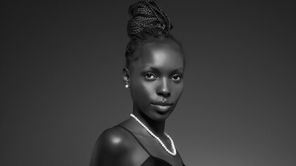 Black and white portrait of a black woman in old hollywood glamour style