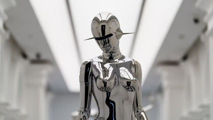 A sleek, futuristic silver robot embodying advanced technology and artificial intelligence