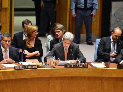 U.S. Secretary of State John Kerry and Uruguay’s Deputy Permanent Representative to the UN, Luis Bermúdez, attend the United Nations Security Council meeting on 23 September 2016