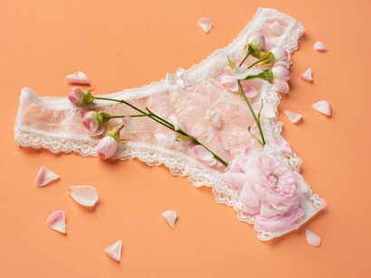 Lace underwear with petals and stems, visual cues that invite desire but also demand a deeper look at agent and power