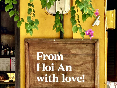 A vibrant sign welcoming visitors with a relaxing atmosphere in Hoi An, Vietnam ©Alma Reyes