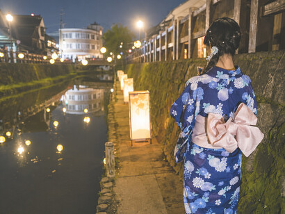 Obon is a traditional Japanese Buddhist observance in which families welcome and honor the spirits of their ancestors, believed to revisit the living each year
