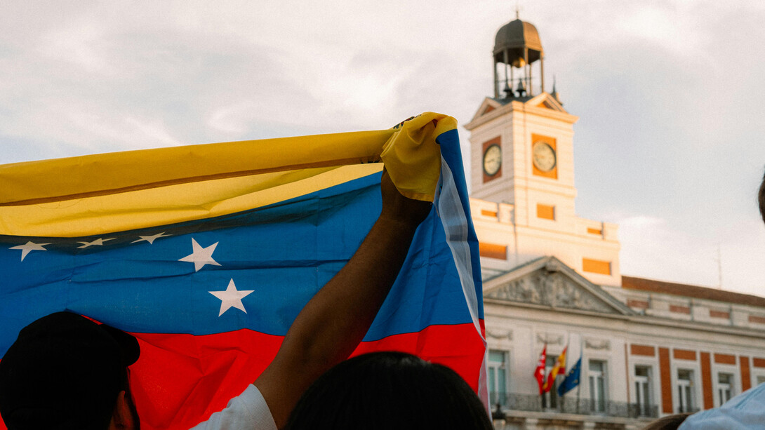 Madrid, Spain Venezuelan flag waving during a protest at Puerta del Sol