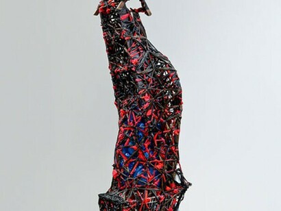 Nari Ward Savior, 1996, Plastic garbage bags, cloth, bottles, shopping cart, metal fence, earth, wheel, mirror, chair, and clocks. 128 x 36 x 23 inches, Installation view: Nerman Museum of Contemporary Art, Overland Park, Kansas, Image courtesy the artist and Lehmann Maupin, New York, and Hong Kong