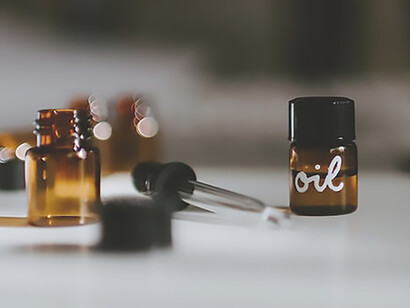 A woman who is making her own skin care oil