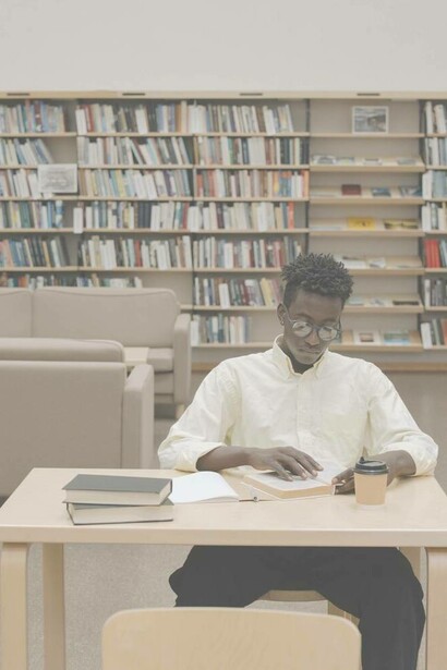 Man busy studying at library