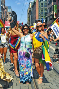 Women and drummers celebrating Christopher Street Day in Berlin
