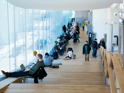Students at the New Helsinki Central Library Oodi utilize modern facilities for collaborative work and study