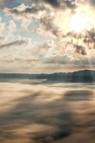 Light peering through the dark clouds