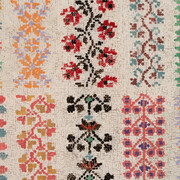 Kirstin Lamb, Cross stitch pattern red, brown, green, blue (detail), 2023. Courtesy of Garvey|Simon