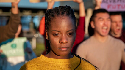 A young Nigerian woman symbolizes a generation full of talent yet held back by a system that refuses to change