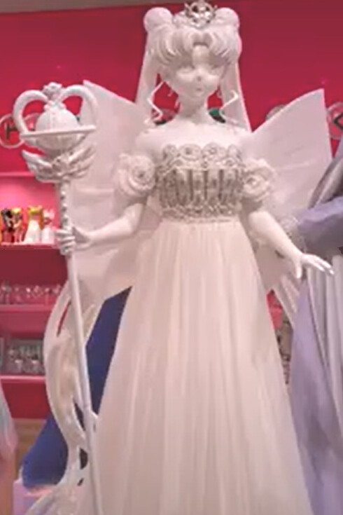 Princess Serenity's iconic white dress in the Sailor Moon series was inspired by the Palladium gown from Christian Dior's Spring/Summer 1992 collection