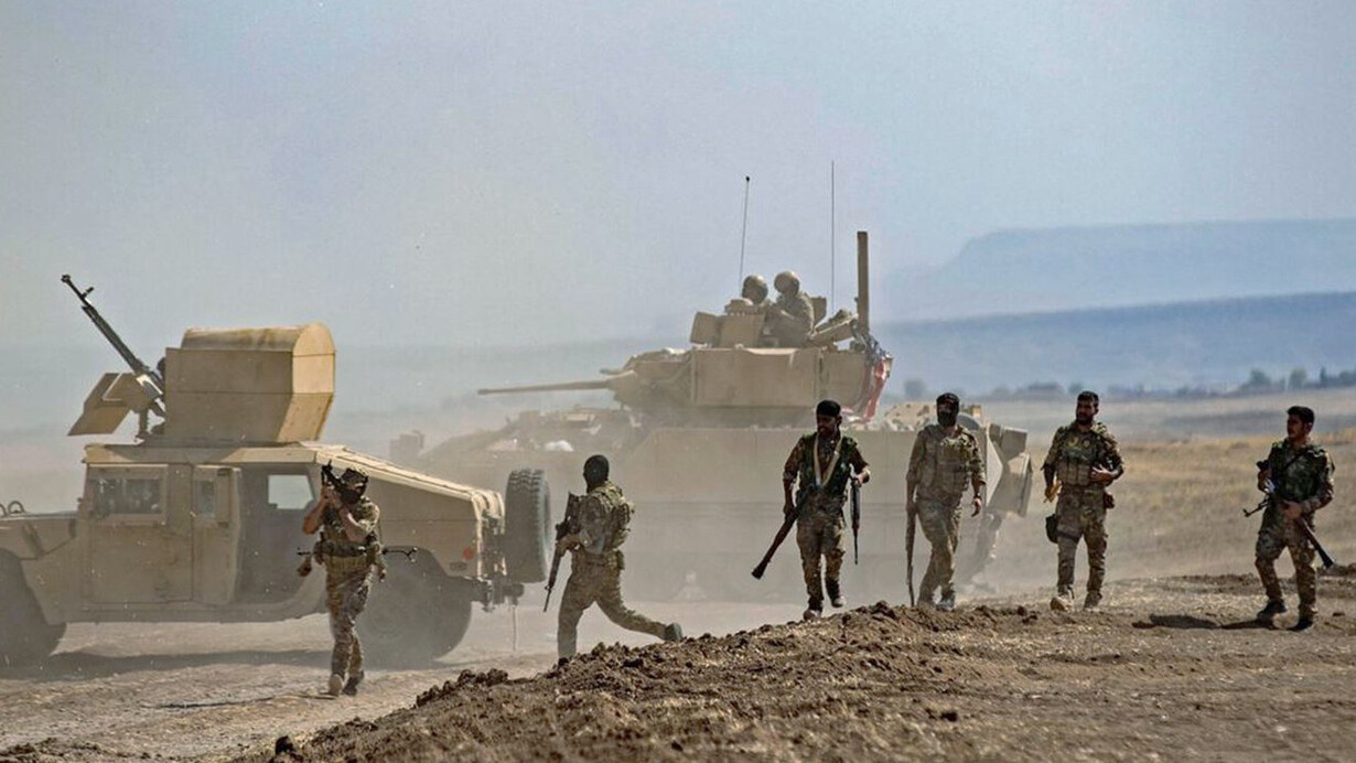 SDF soldiers stand guard at a frontline position in northeastern Syria, where the collapse of the Assad regime has reshaped the balance of power and exposed the Kurds to new vulnerabilities