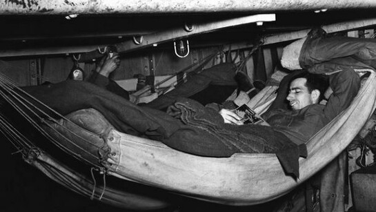 A soldier, reading and having a rest during the Second World War