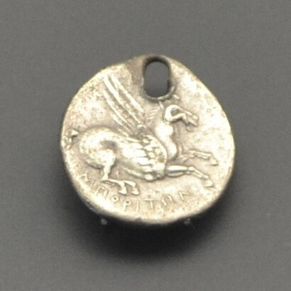 Dracma greca proveniente da Emporion (Ampurias), dopo il 218 a.C. Museo della Preistoria di Valencia